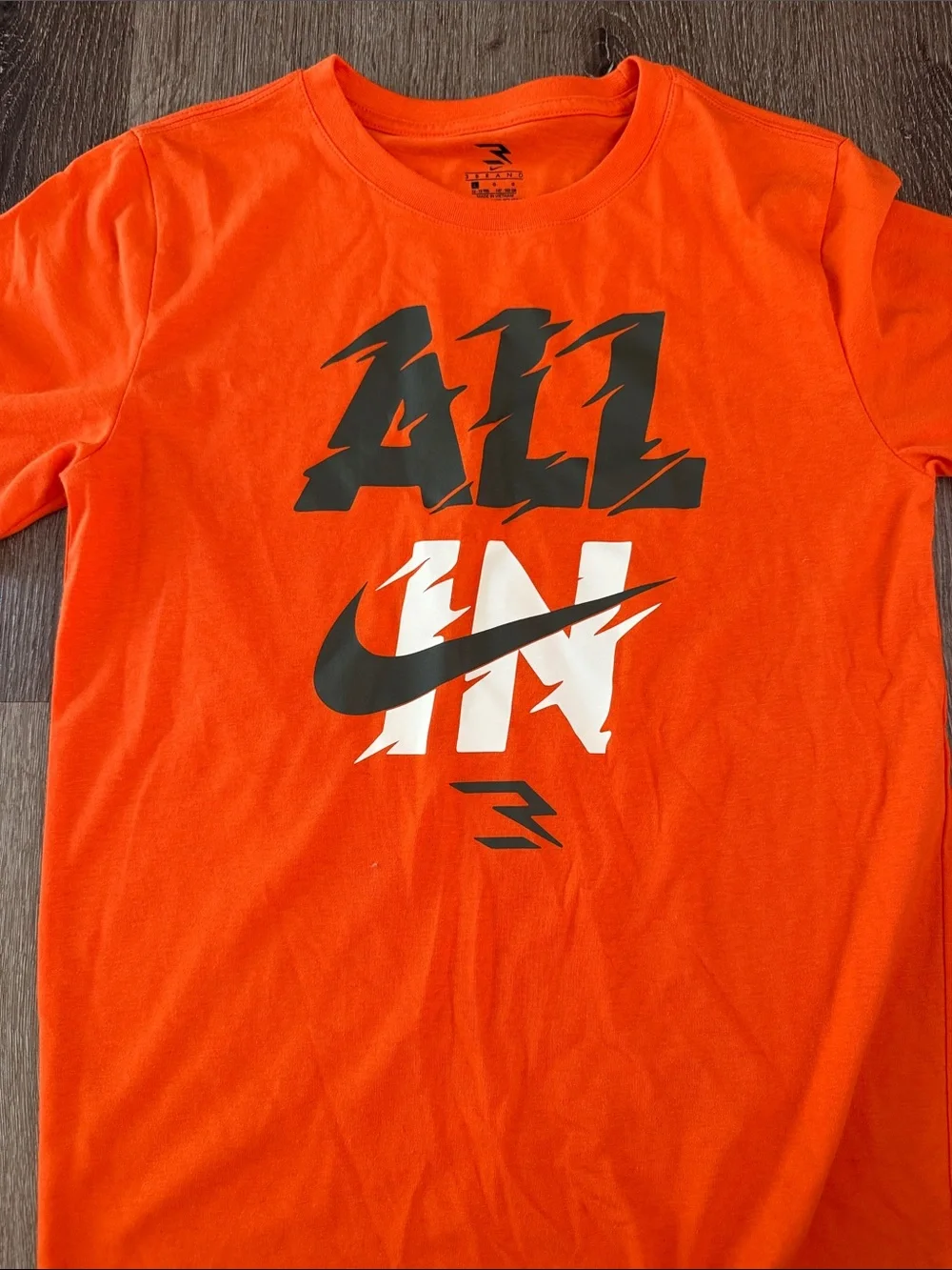 Nike Orange Graphic 'All In' Tee with Black & White Logo